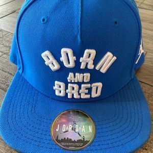 Jordan Born and Bred SnapBack flatbill hat with original sticker on bill.